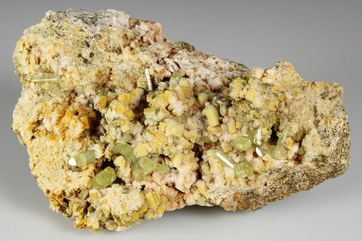 Lustrous, Yellow Apatite Crystals on Feldspar - Morocco #185476